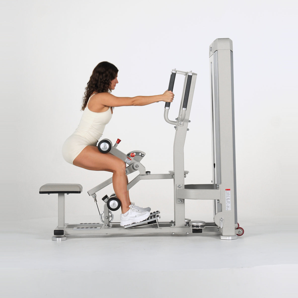 Gluteleader Standing Hip Thrust (GL-1004) - female athlete actively using the machine